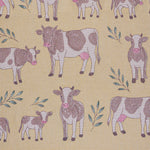 Pattern of cows and calves on a yellow beige background