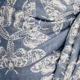 Pattern of white butterflies on a blue background