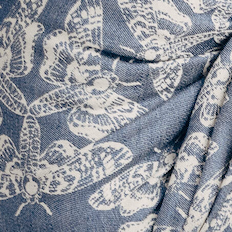 Pattern of white butterflies on a blue background