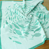 Swirling Fishes Emerald Half linen Blanket by Didymos Didymos