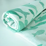 Swirling Fishes Emerald Half linen Blanket by Didymos Didymos