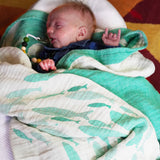 Swirling Fishes Emerald Half linen Blanket by Didymos Didymos