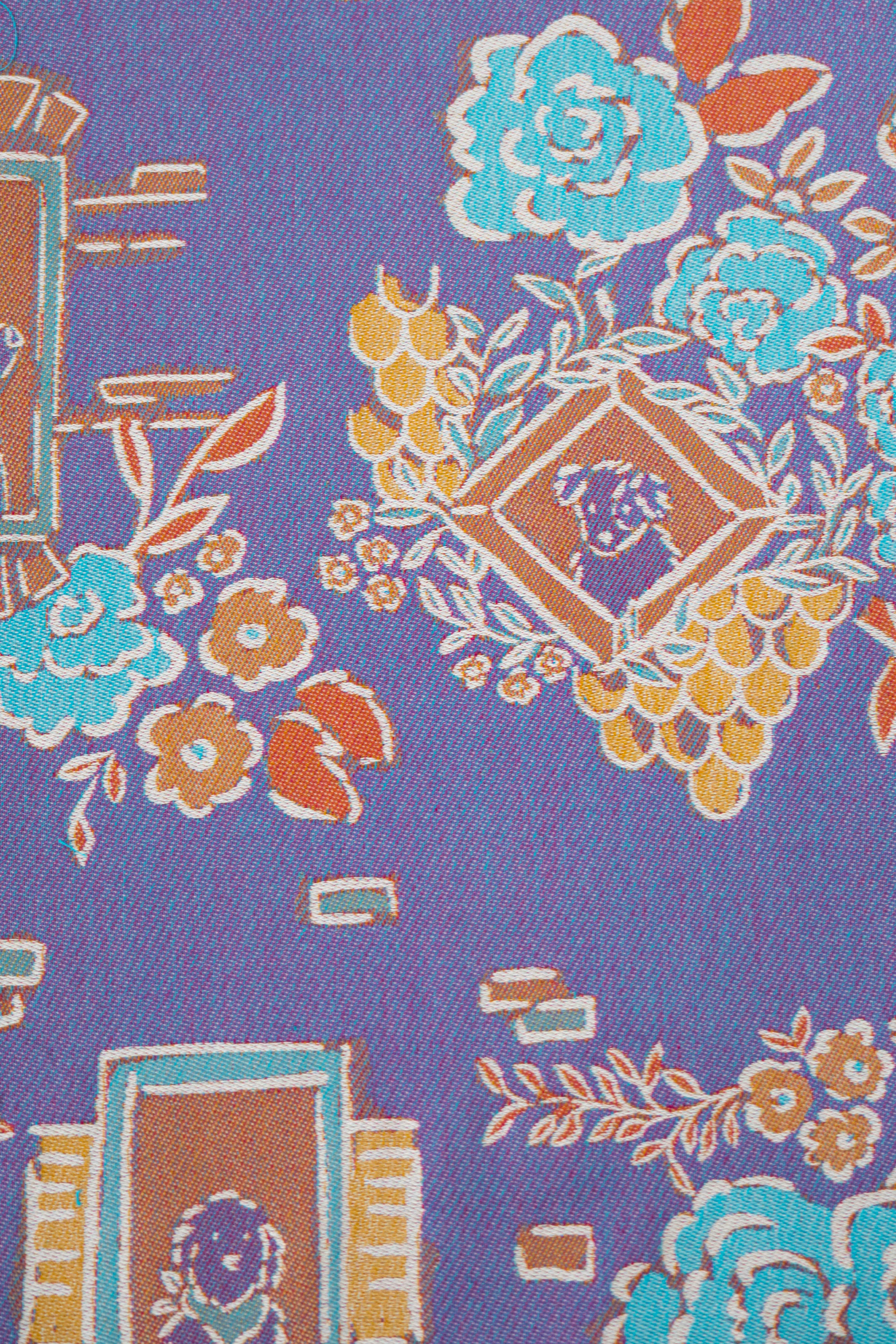 Floral and decorative pattern with dog illustrations on a purple background
