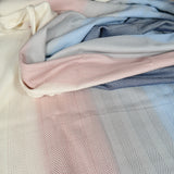 Lisca Opal Woven Wrap by Didymos, weave detail in cream, blue and pink
