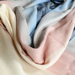 Lisca Opal Woven Wrap by Didymos, weave detail in cream and pink
