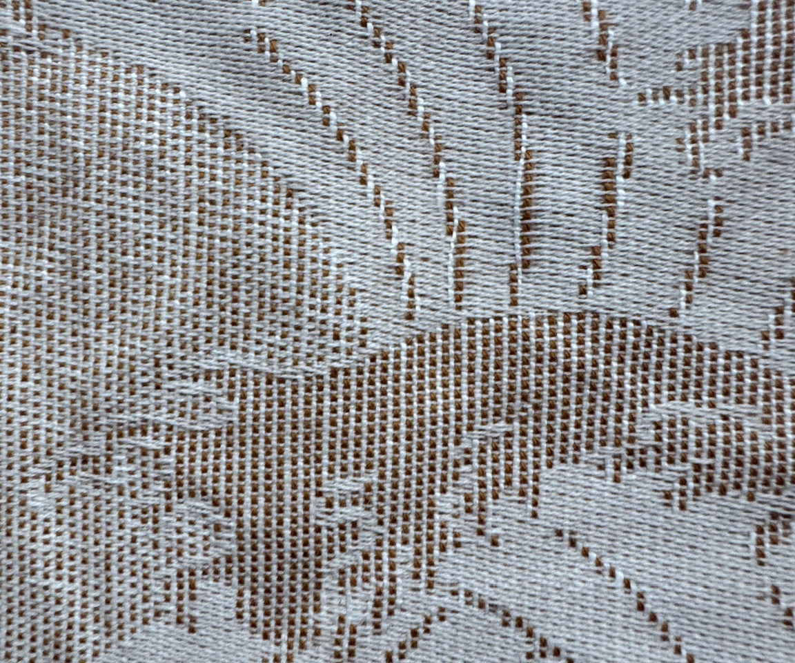 Close-up of a textured fabric with a subtle pattern