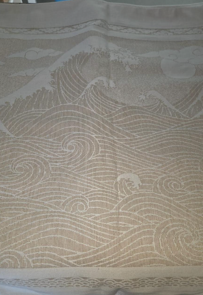 Textile with wave pattern on a ecru warp with woodthrush cotton  organic cotton wetspun linen