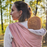 Prima Rosewood Woven Wrap by Didymos, back carry outdoors in autumn woods