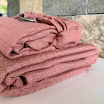 Prima Rosewood by Didymos, the woven wrap and DidySling folded and stacked