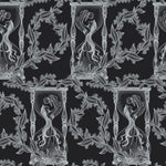 Decorative pattern with classical figures and foliage on a black background