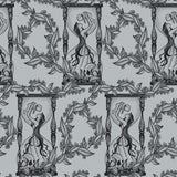 Decorative pattern with stylized figures and foliage and skulls on a white background