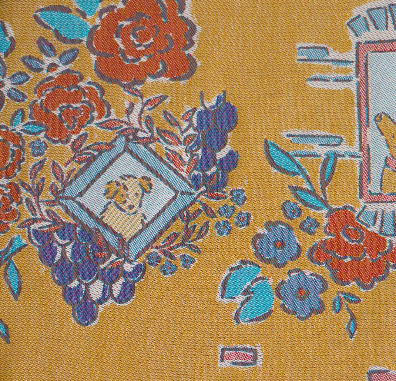 Floral and decorative pattern with dog illustrations on a yellow background